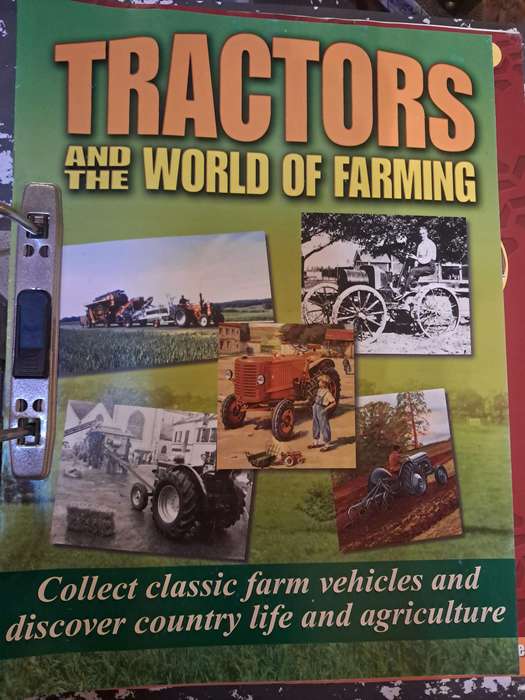 Complete set of Hachette series of diecast model tractors.
