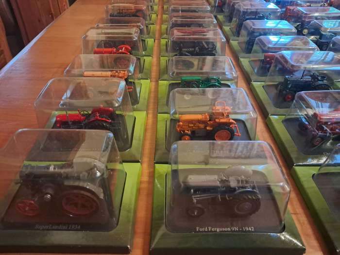 Complete set of Hachette series of diecast model tractors.