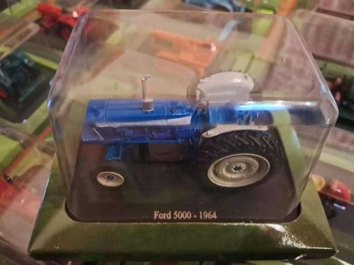 Complete set of Hachette series of diecast model tractors.