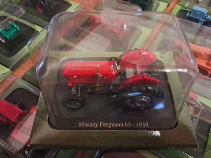 Complete set of Hachette series of diecast model tractors.