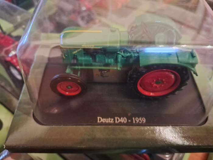 Complete set of Hachette series of diecast model tractors.