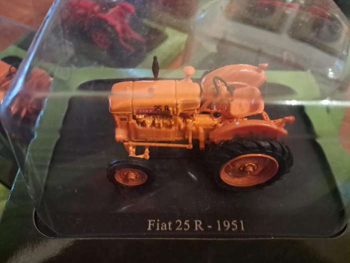 Complete set of Hachette series of diecast model tractors.