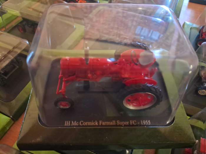 Complete set of Hachette series of diecast model tractors.