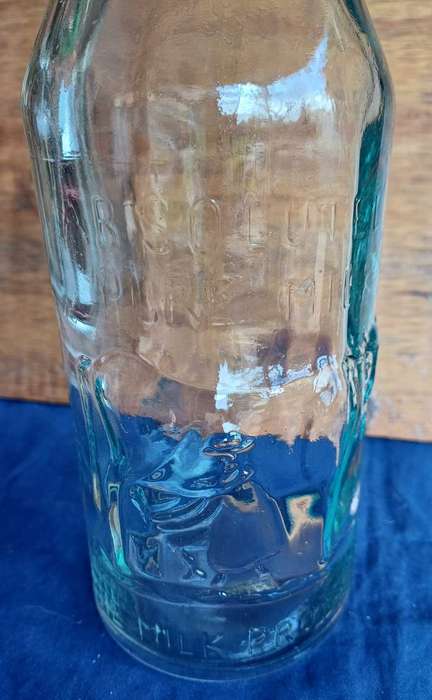 Vintage absolutely pure milk bottle