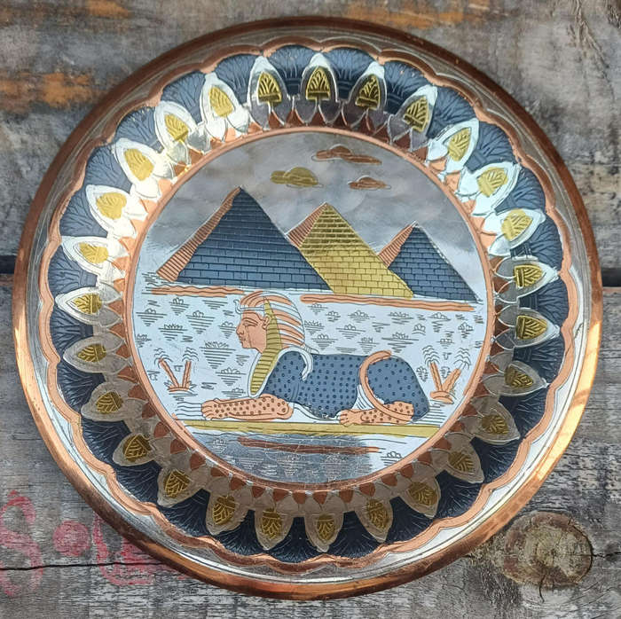 Vintage Egyptian metal sphinx wall plate