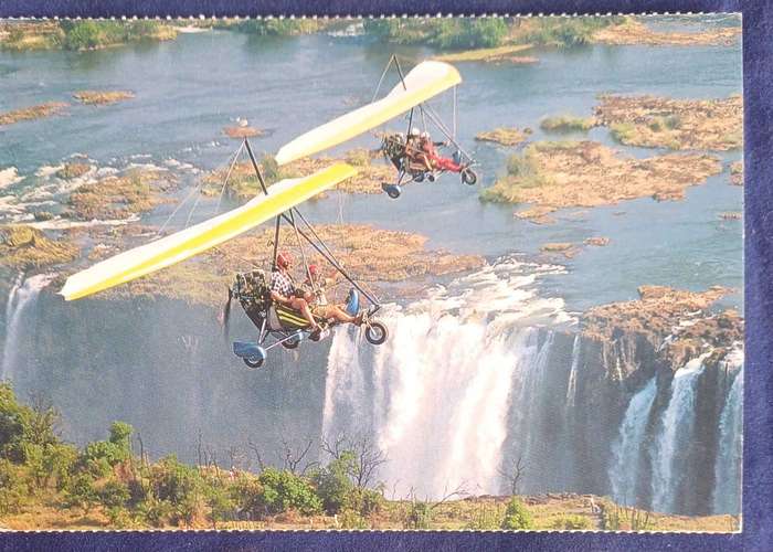 Microlites over the Victoria Falls, Zimbabwe postcard