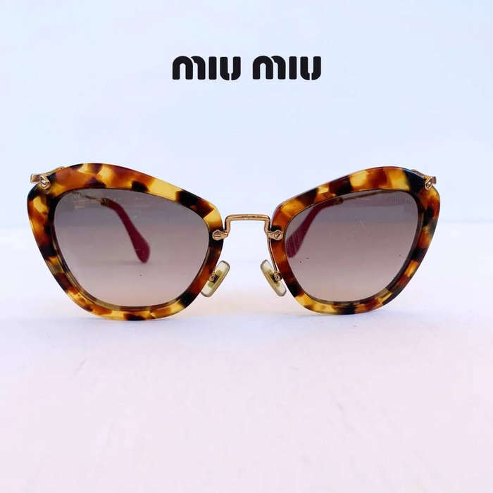 Miu Miu Cat Eye Sunglasses  Tortoise Shell / Red Arm Tips