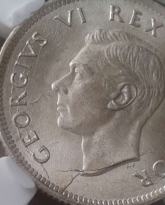 Nice 1942 union silver shilling SANGS MS63 (Cracked Die)
