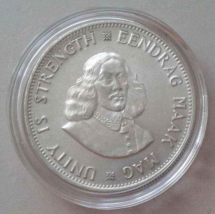 Encapsulated 1962 silver 20c