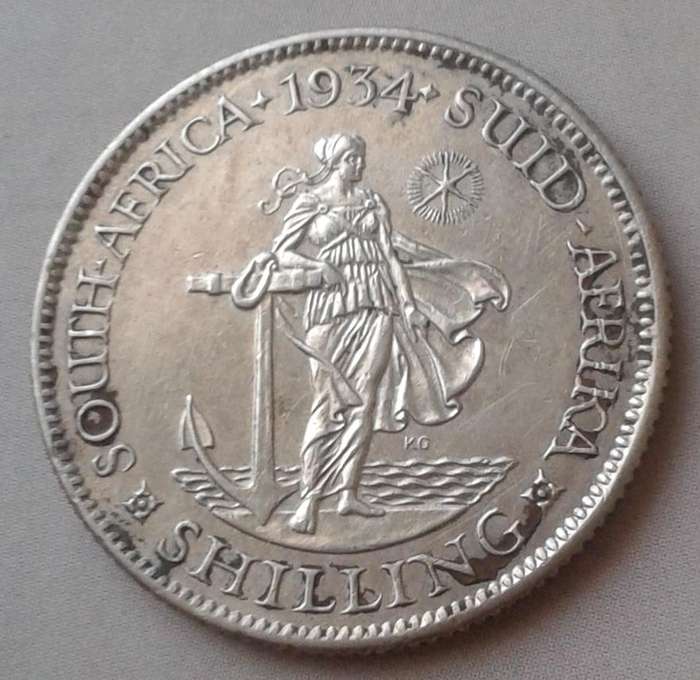 1934 Union silver shilling with AU Details