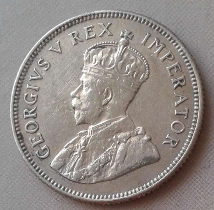 1934 Union silver shilling with AU Details