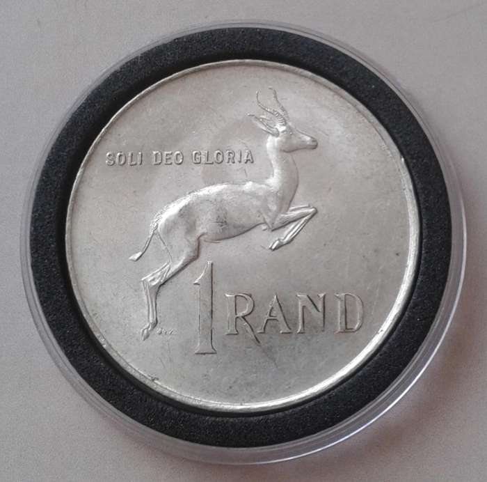 Encapsulated 1966 Republic silver R1 "Tagged Ear".