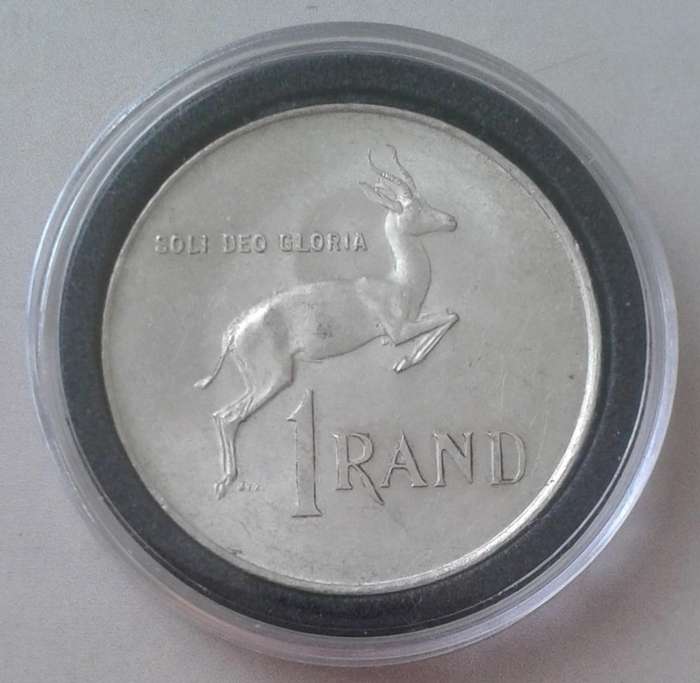 Encapsulated 1966 Republic silver R1 "Tagged Ear".