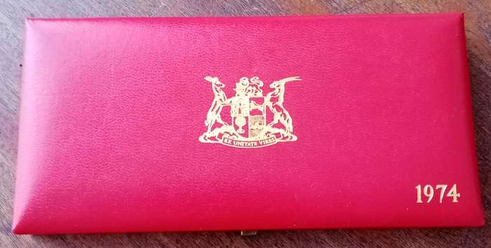 Partial 1974 proof set in red box (50c-1/2c).