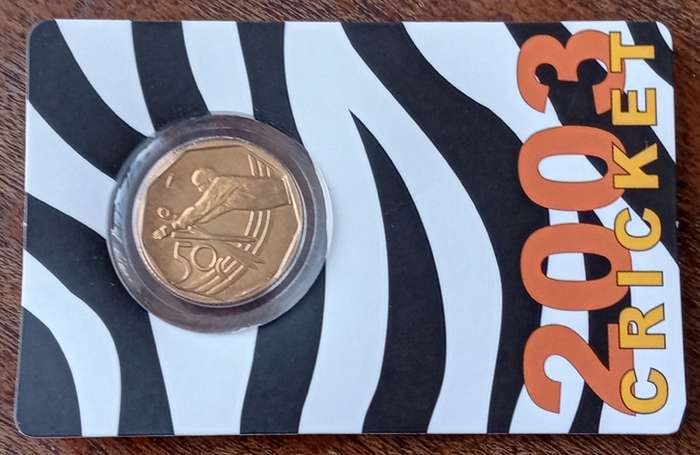 Scarce 2003 cricket 50c in card minted in Coin World (low mintage).