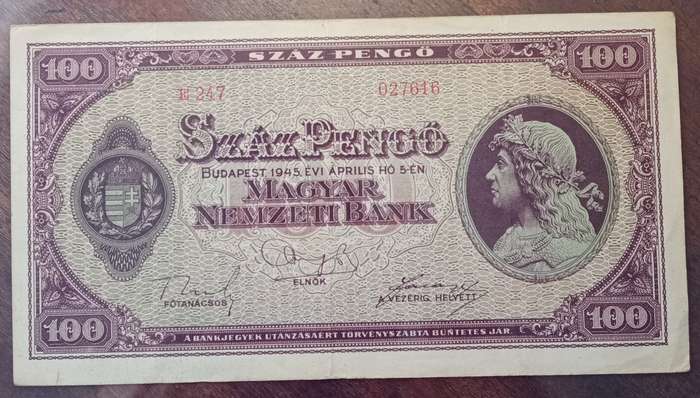 1945 WW2 Hungary 100 Pengő note in hard plastic sleeve