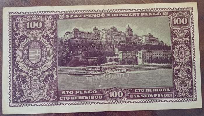 1945 WW2 Hungary 100 Pengő note in hard plastic sleeve