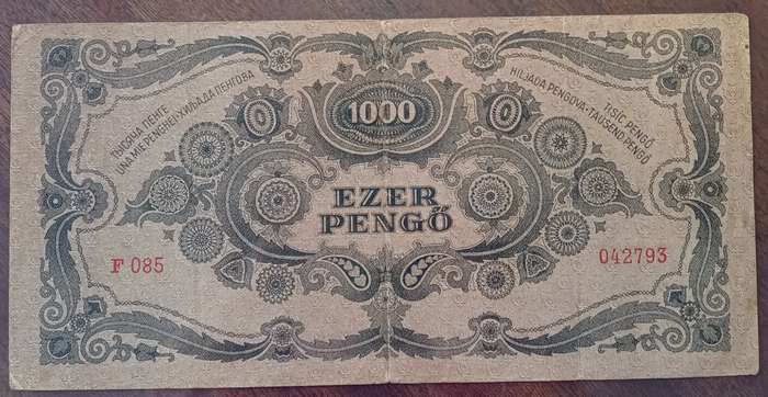 1945 WW2 Hungary 1000 Pengő note in hard plastic sleeve