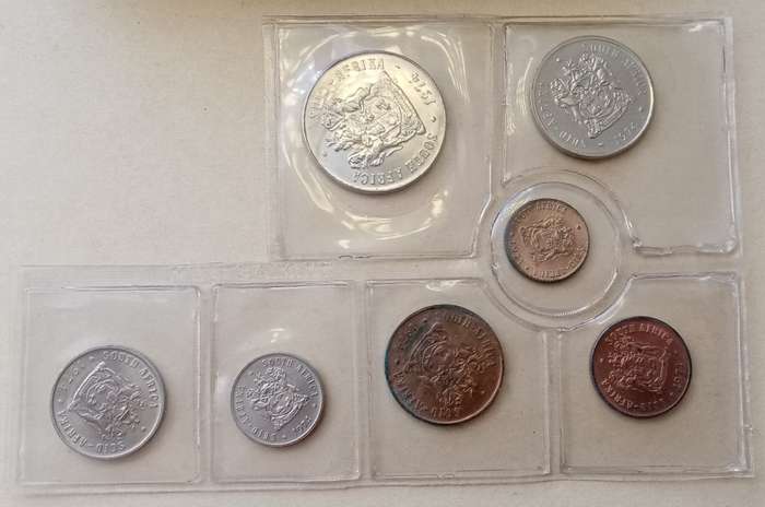 Partial 1974 uncirculated Mint pack (50c-1/2c) with scarcer 1/2c