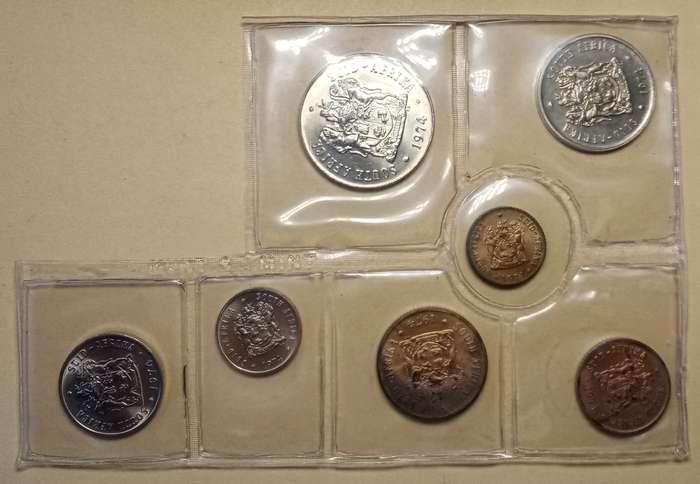 Partial 1974 uncirculated Mint pack set (50c-1/2c) with scarcer 1/2c.