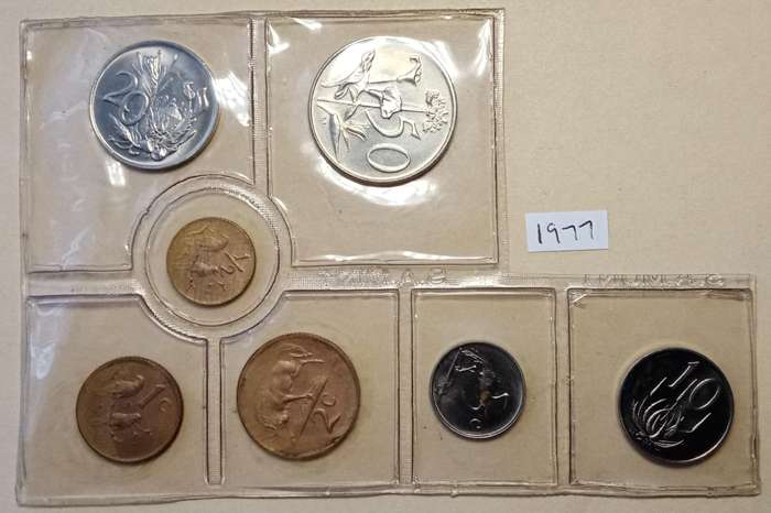 Partial 1977 uncirculated Mint pack (50c-1/2c) with scarcer 1/2c