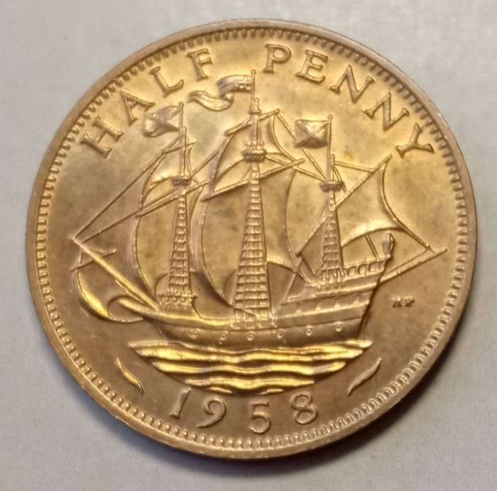 Uncirculated 1959 British 1/2 Penny in a capsule