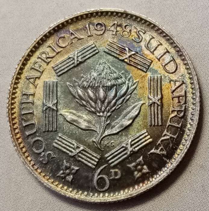 1948 Union silver sixpence in top grade with great toning