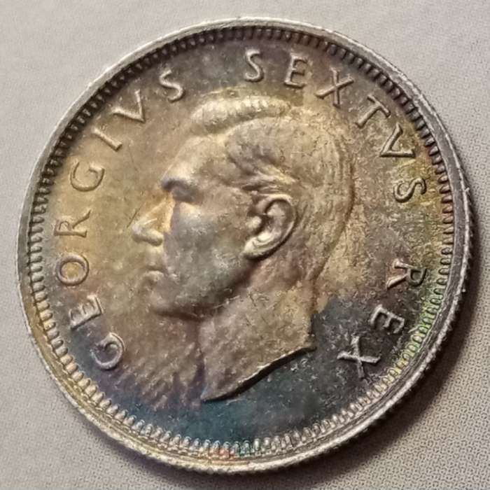 1948 Union silver sixpence in top grade with great toning