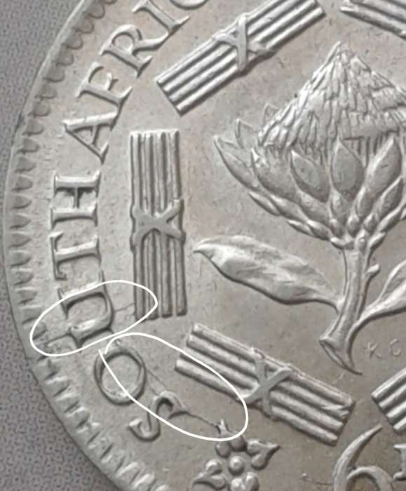 Higher grade 1941 union silver sixpence with reverse die cracks