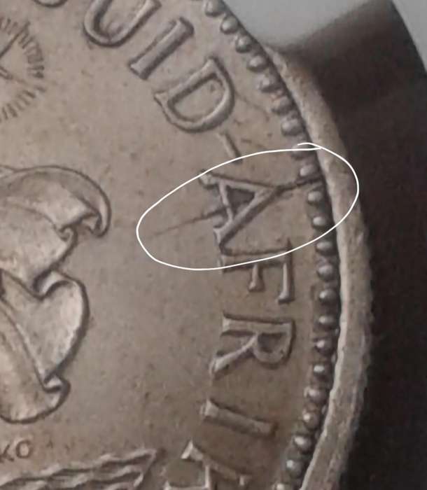 1958 Union silver shilling NGC MS61 with reverse die crack