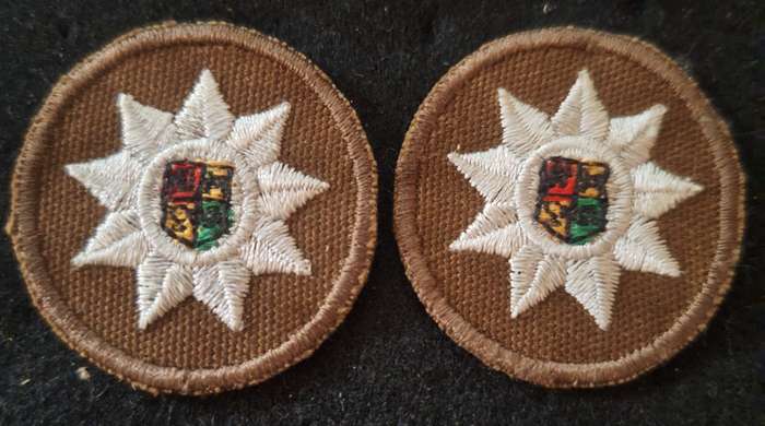 SADF NUTRIA  SEW ON 9 POINT STAR PIPS PAIR FOR NUTRIA S/SGT BRASSARDS.