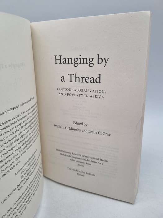 Hanging by a Thread : Cotton, Globalization, and Poverty in Africa -  Moseley & Gray