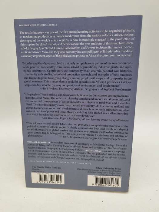 Hanging by a Thread : Cotton, Globalization, and Poverty in Africa -  Moseley & Gray