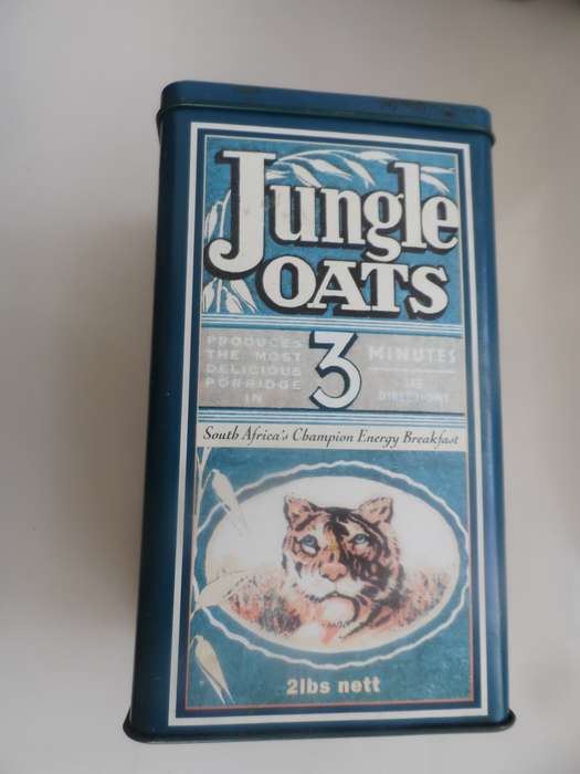 VINTAGE COLLECTIBLE , JUNGLE OATS,  LIDDED STORAGE TIN