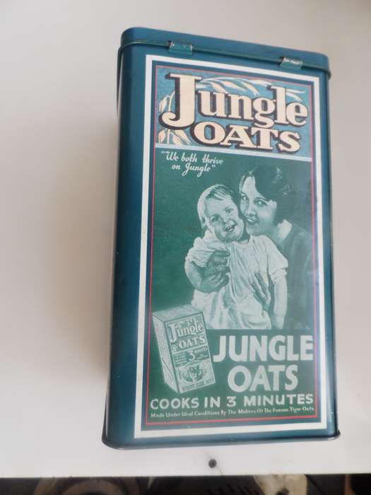 VINTAGE COLLECTIBLE , JUNGLE OATS,  LIDDED STORAGE TIN