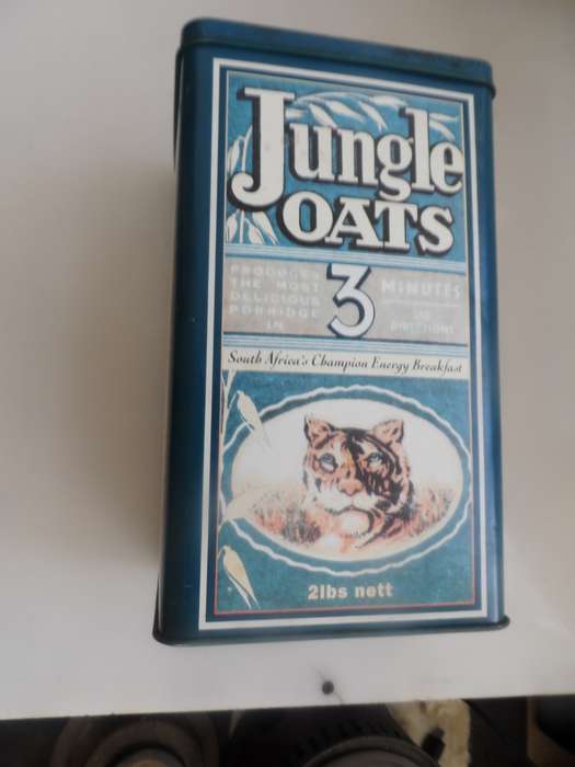 VINTAGE COLLECTIBLE , JUNGLE OATS,  LIDDED STORAGE TIN