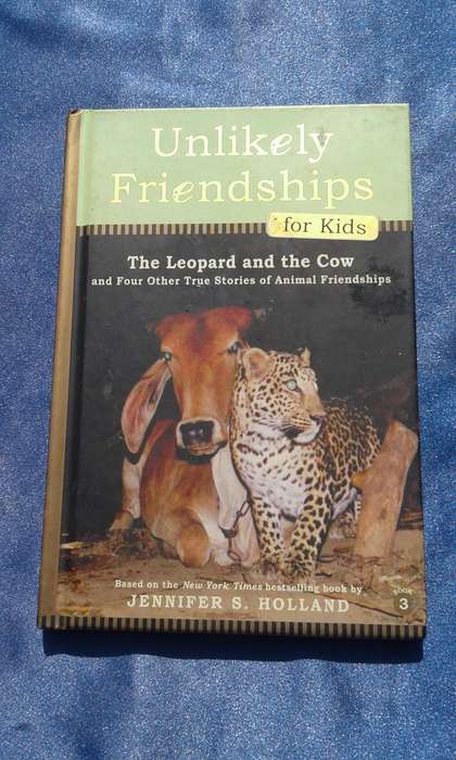 "Unlikely Friendships"  for kids aged 7 up.  Hard cover.