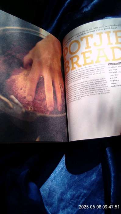 SIGNED.  "Cooked in Africa" Justin Bonello.  Soft cover.