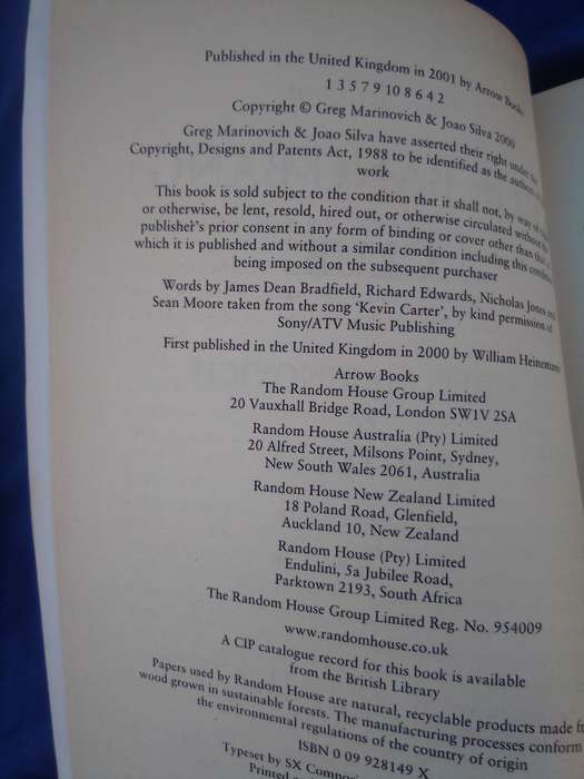 "The Bang Bang Club" Greg Marinovich and Joao Silva.  Soft cover.