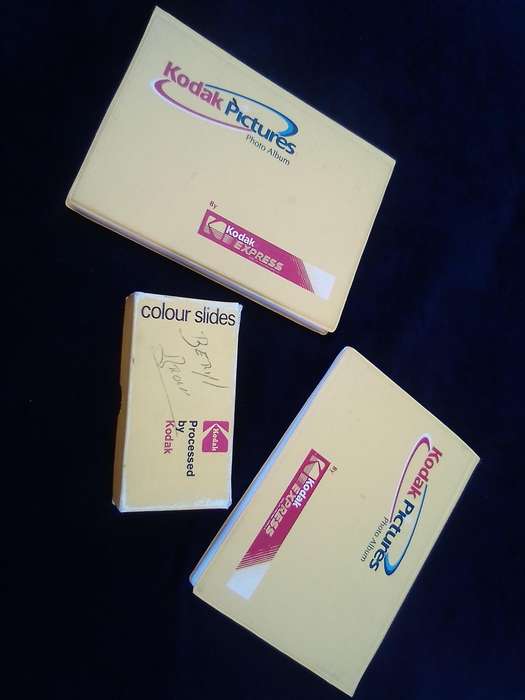 Kodak joblot.  2 photo albums and a handful of slides.