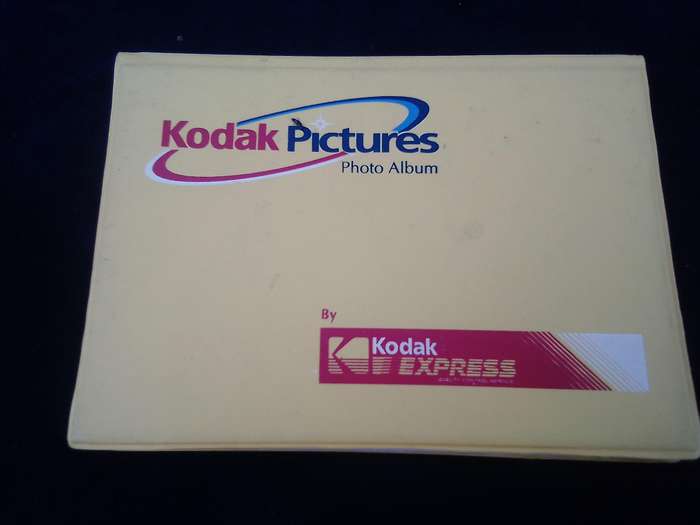 Kodak joblot.  2 photo albums and a handful of slides.