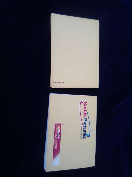 Kodak joblot.  2 photo albums and a handful of slides.