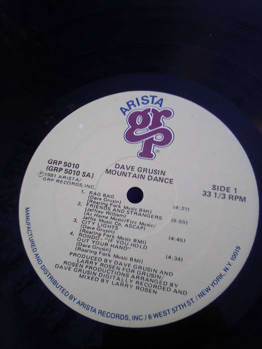 L.P.  Dave Grusin.  Mountain Dance. Cover: Very good.  L.P.:Very good.
