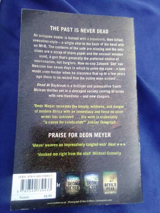 "Dead at Daybreak"  Deon Meyer.  Soft cover.