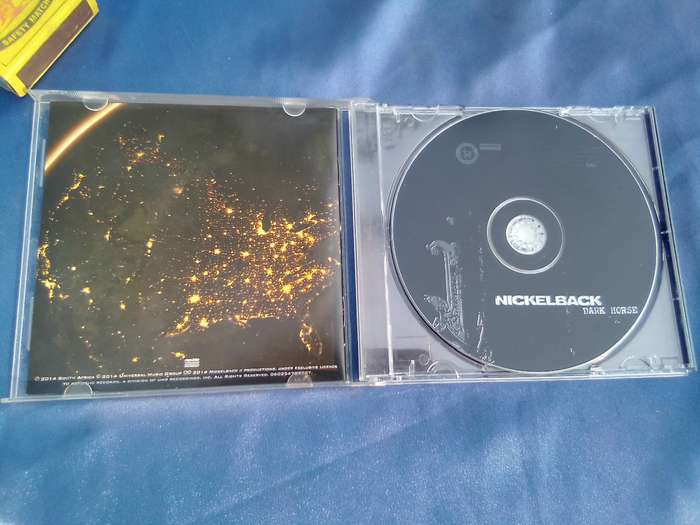 CD. Nickelback". No Fixed Address.