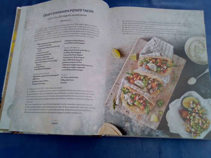 "Cook Share Eat Vegan". Hard cover.