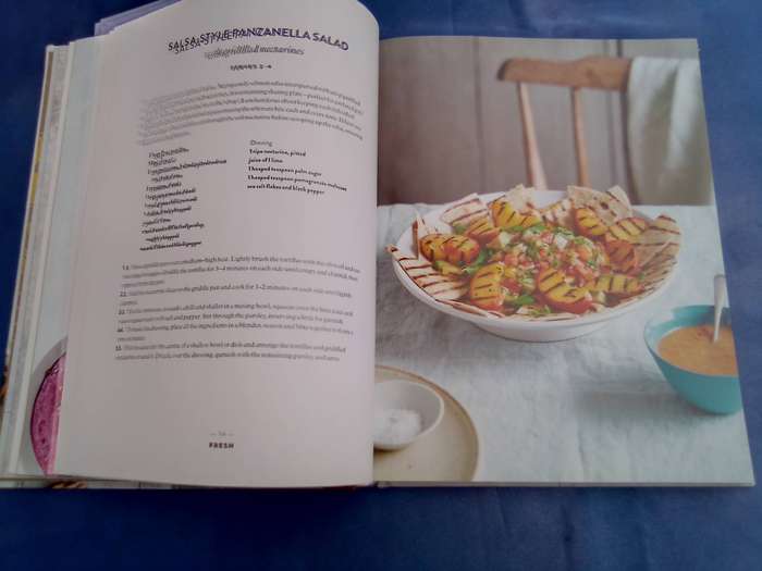 "Cook Share Eat Vegan". Hard cover.
