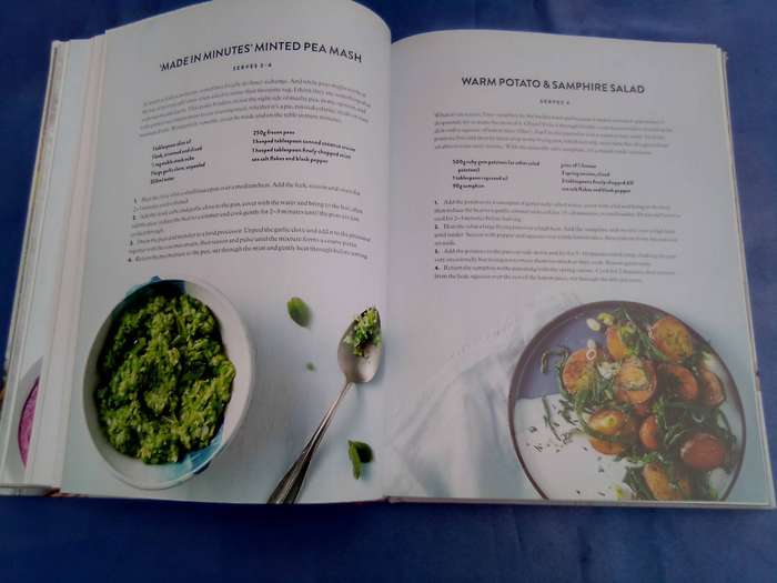 "Cook Share Eat Vegan". Hard cover.