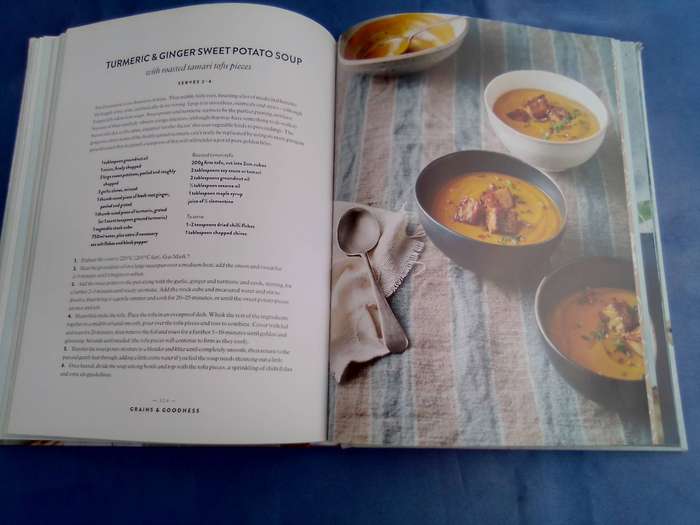 "Cook Share Eat Vegan". Hard cover.