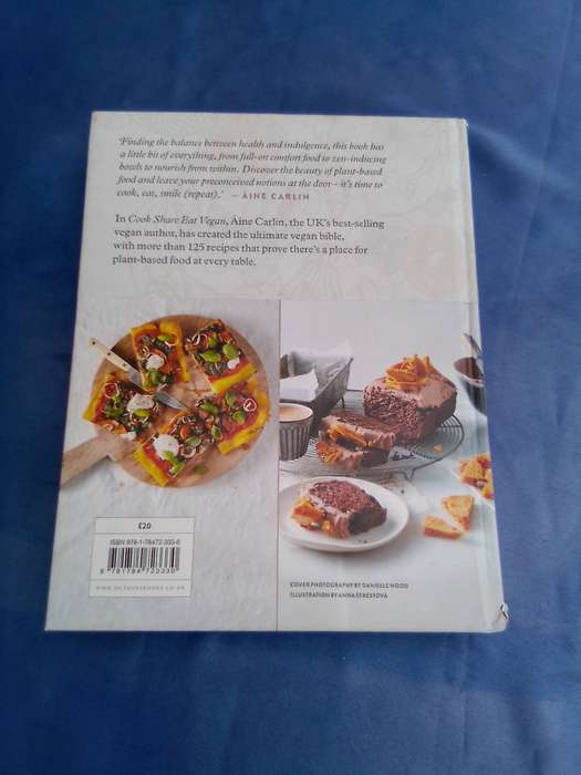 "Cook Share Eat Vegan". Hard cover.